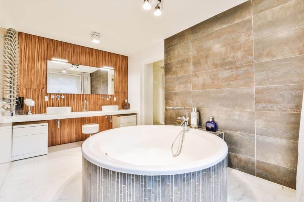 luxurious round raised soaker tun in decadent bathroom
