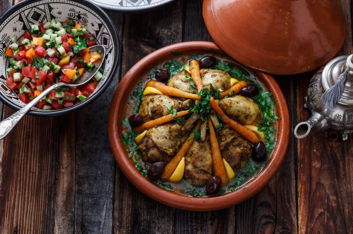 A close view of traditional Moroccan food - chicken tajine with couscous. A great option for Christmas in Morocco.