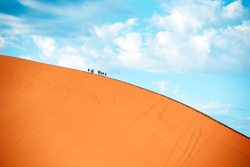 Climbers on Dune 45 in the Sossusvlei area, on a holiday to Namibia.