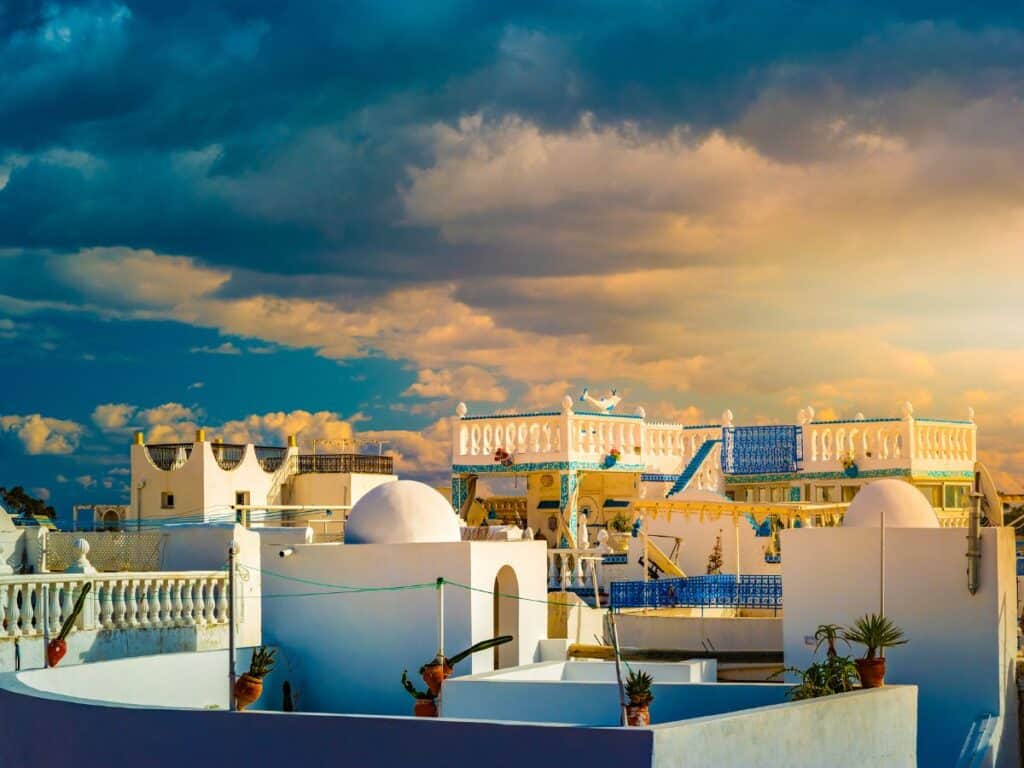White buildings agains a stormy sky in the old medina, Hammamet, Tunisia